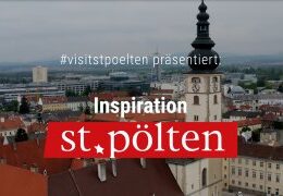 St. Pölten tourism office logo on a picture of St. Pölten from above